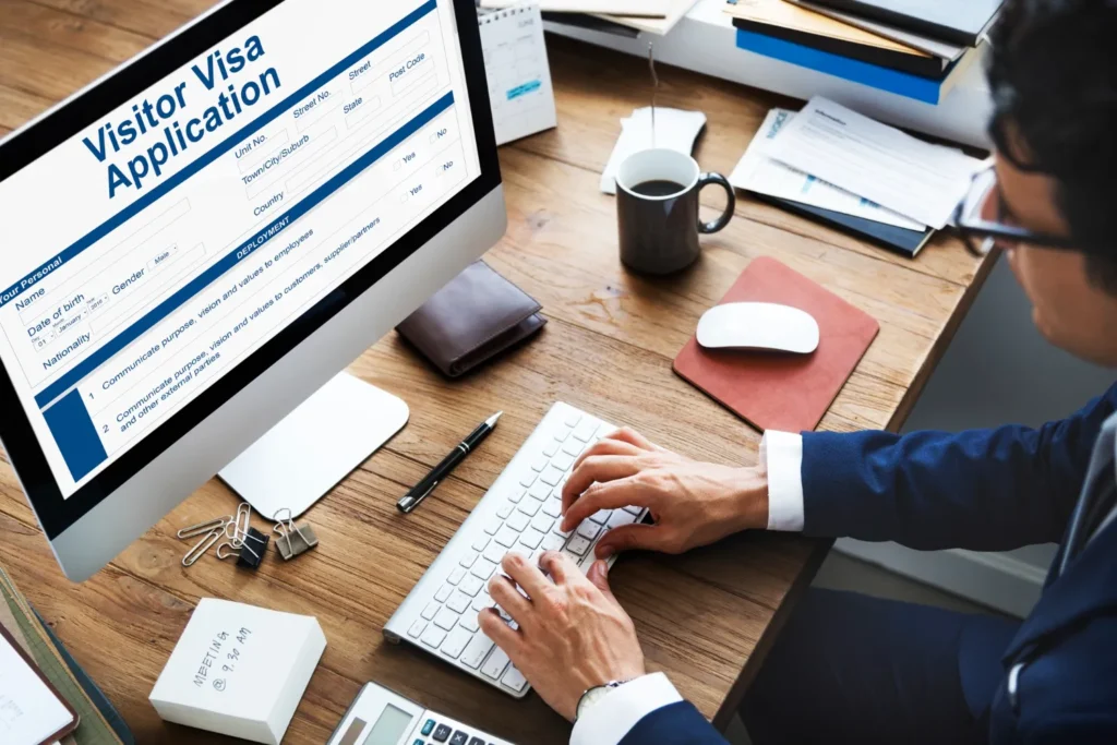 Person reviewing UAE visa documents on a laptop