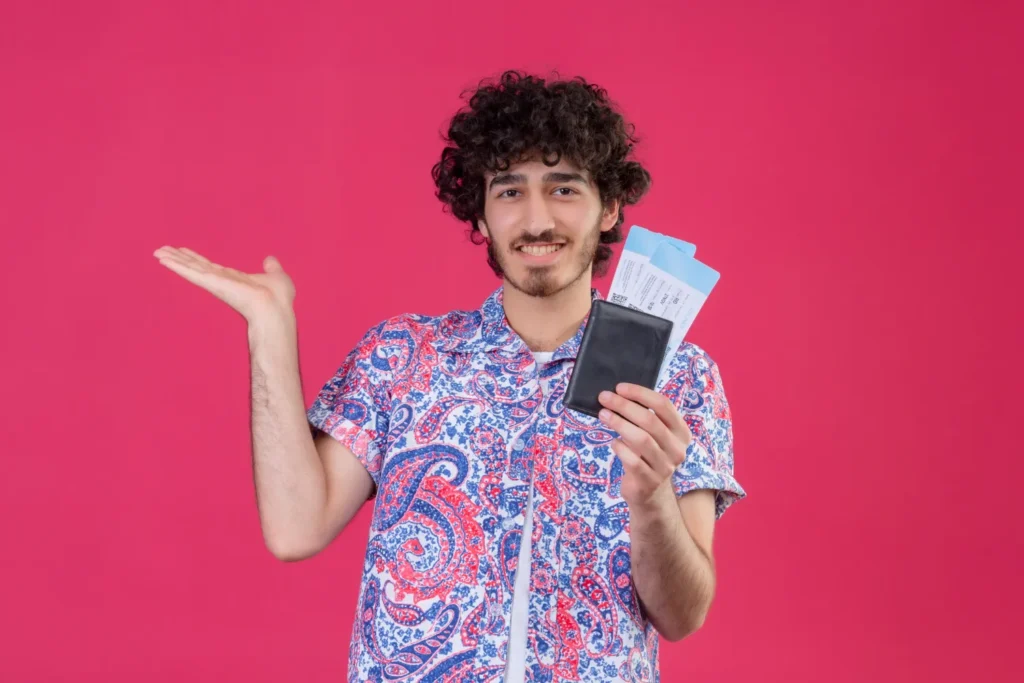 Man holding visa and identification documents