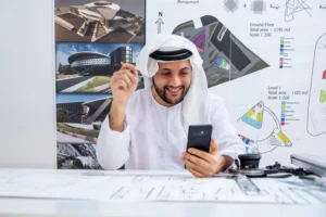 Business professional reviewing documents and financial information in Abu Dhabi